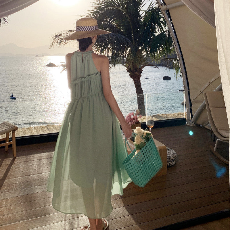 Stylish And Elegant Draped Textured Sleeveless Halterneck Holiday Dress