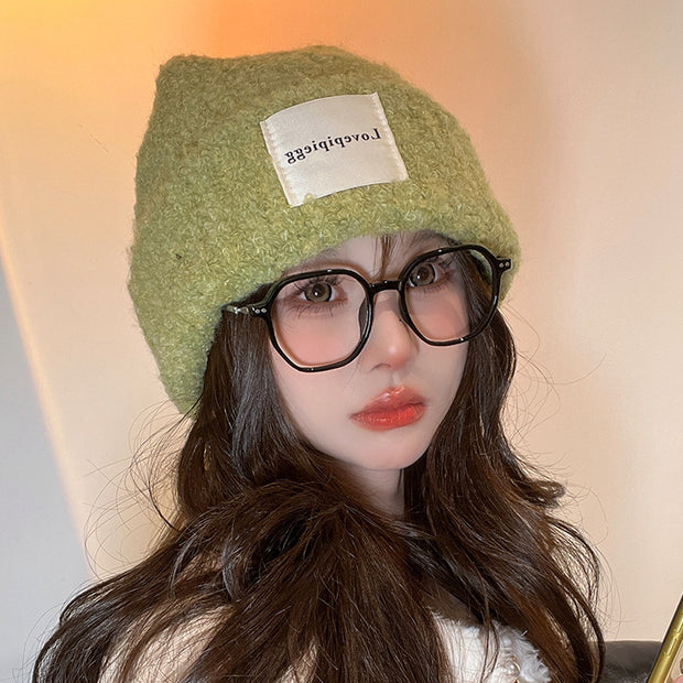 Patch loose warm ear protection knitted hat