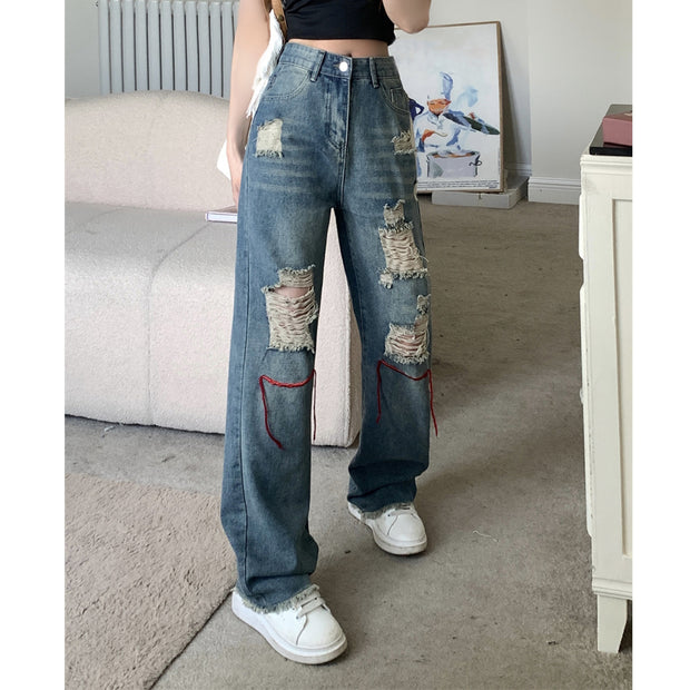 Straight-leg ripped loose high-rise jeans