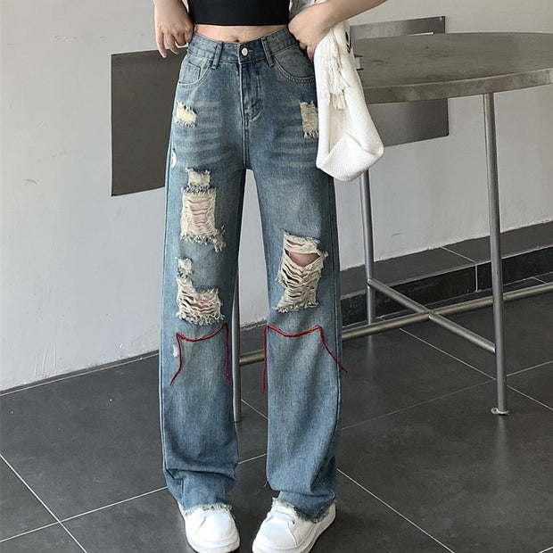 Straight-leg ripped loose high-rise jeans