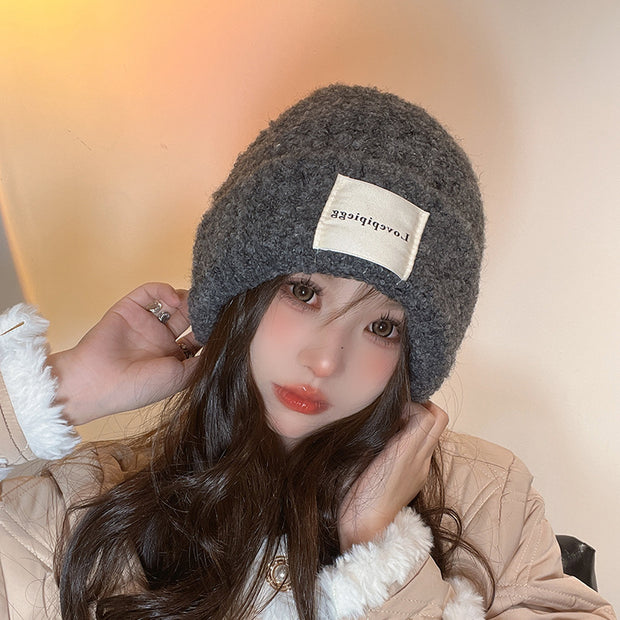 Patch loose warm ear protection knitted hat