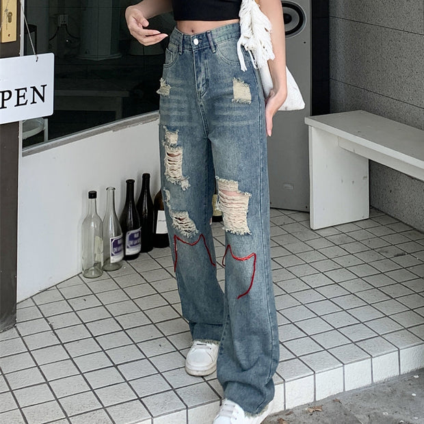 Straight-leg ripped loose high-rise jeans