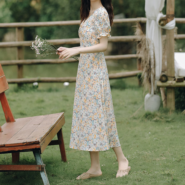 V-neck twisted puff sleeve slit waist floral dress