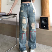 Straight-leg ripped loose high-rise jeans