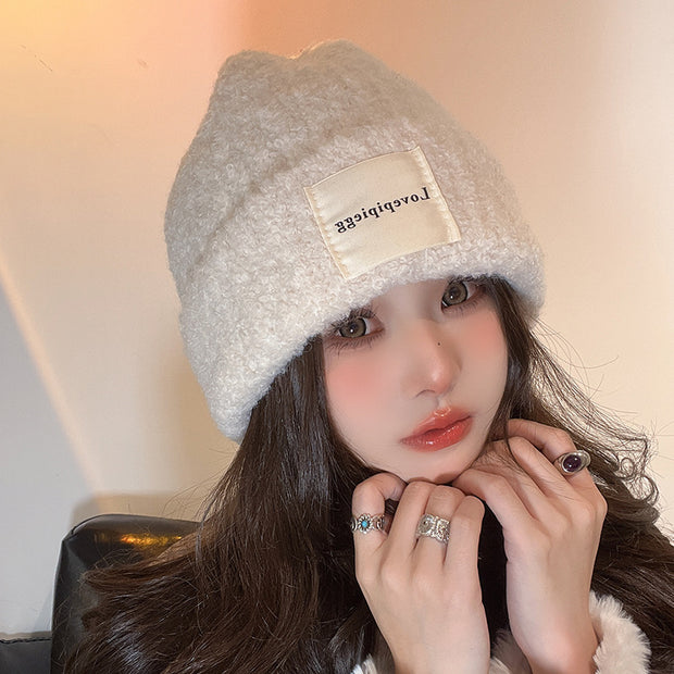 Patch loose warm ear protection knitted hat