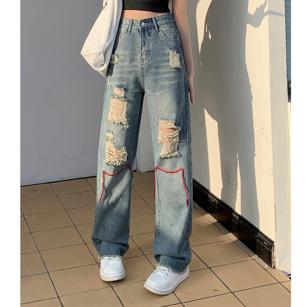 Straight-leg ripped loose high-rise jeans