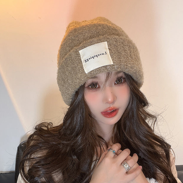 Patch loose warm ear protection knitted hat