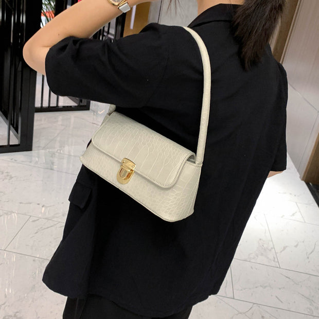 Stone pattern lock shoulder handbag