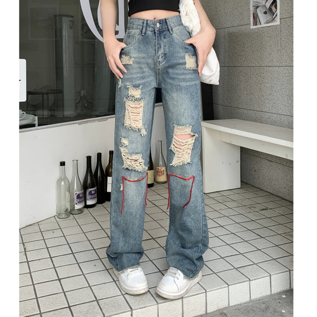 Straight-leg ripped loose high-rise jeans