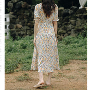 V-neck twisted puff sleeve slit waist floral dress