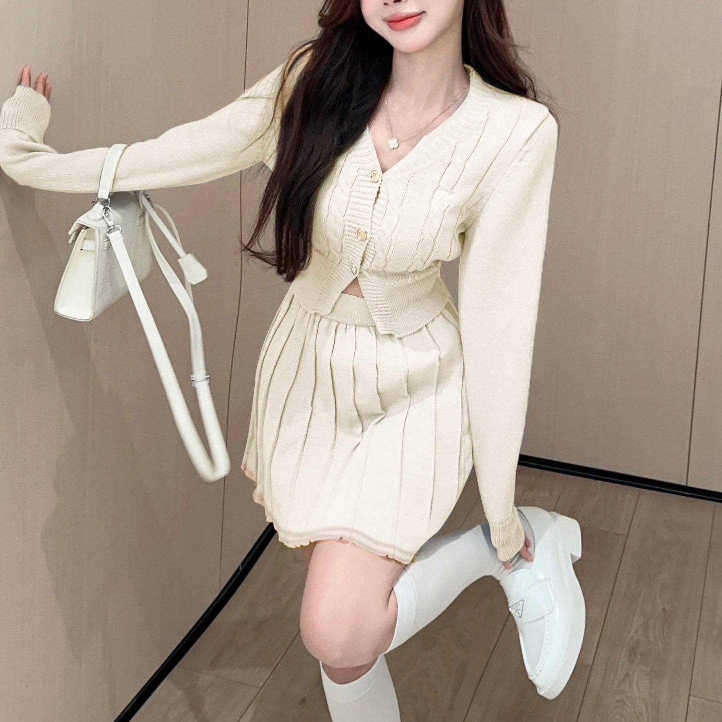 Fashionable And Sexy V-Neck Single-Breasted Knitted Cardigan Top And Skirt Two-Piece Set
