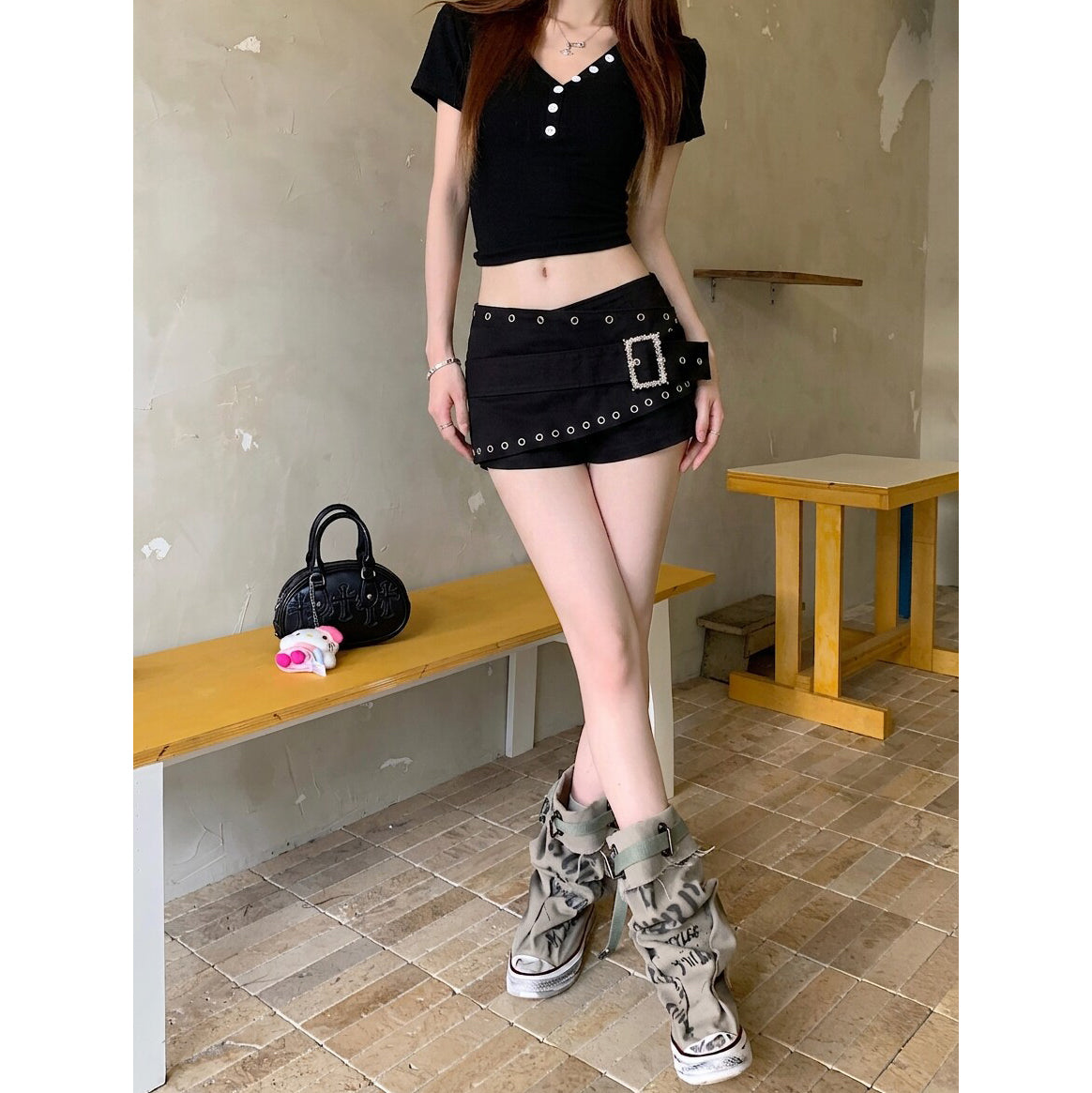 Black low-rise punk shorts with studs