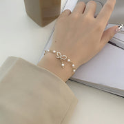 Bow rhinestone pearl alloy fashion bracelet