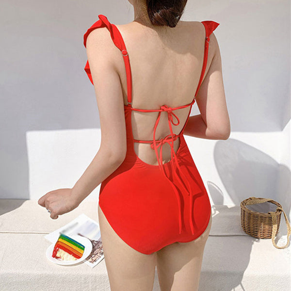 Solid color one-piece backless beach resort swimsuit