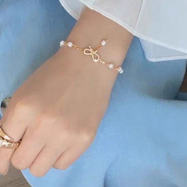 Bow rhinestone pearl alloy fashion bracelet