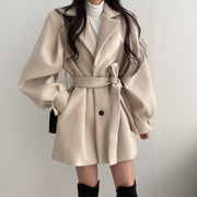Warm woolen coat with lantern sleeves and belt