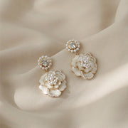 French temperament pearl petal silver stud earrings