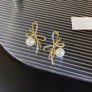 Silver post bow glitter diamond pearl earrings